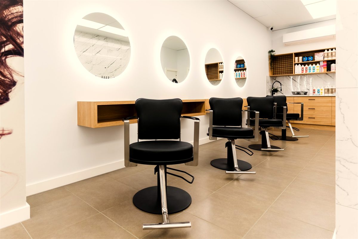 Styling chairs and marble detailing at Fallachi Hair Berwick