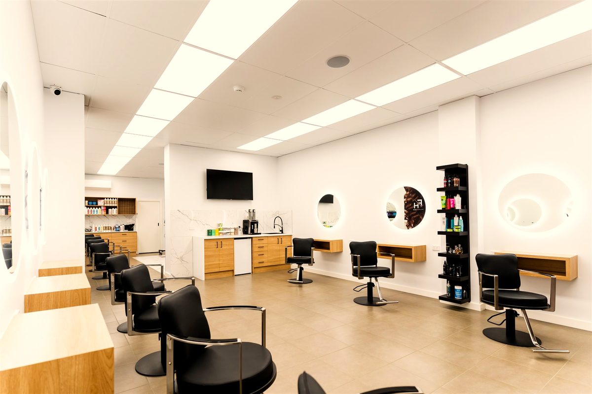 Styling stations and coffee area inside Fallachi Hair, Berwick